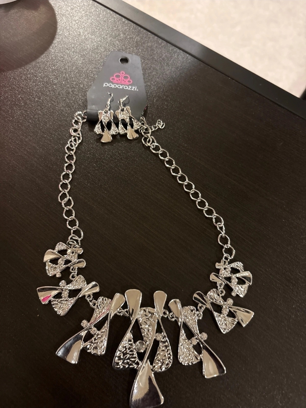 paparazzi Silver Bow and Teardrop Statement Necklace